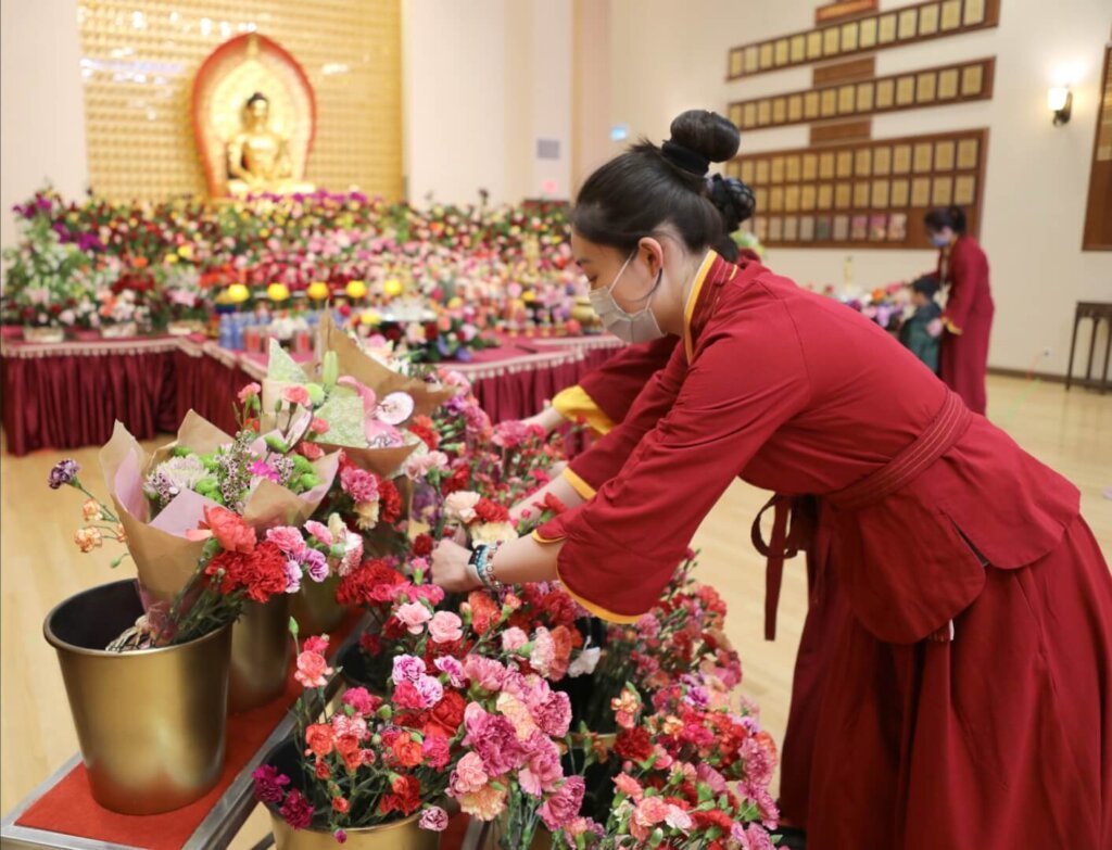Offering Flower to the Buddha
